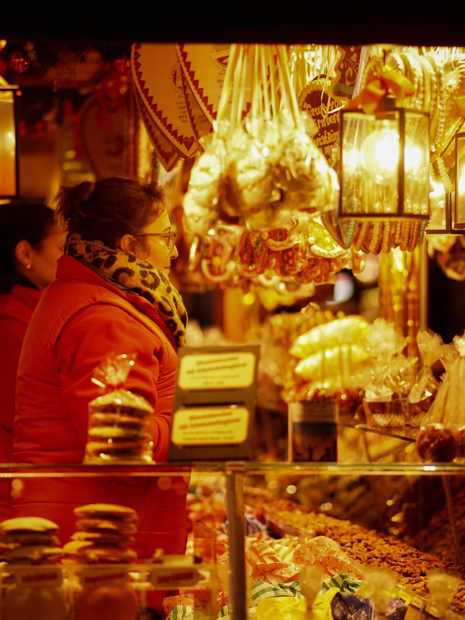 Golden ornaments at a Christmas market stall