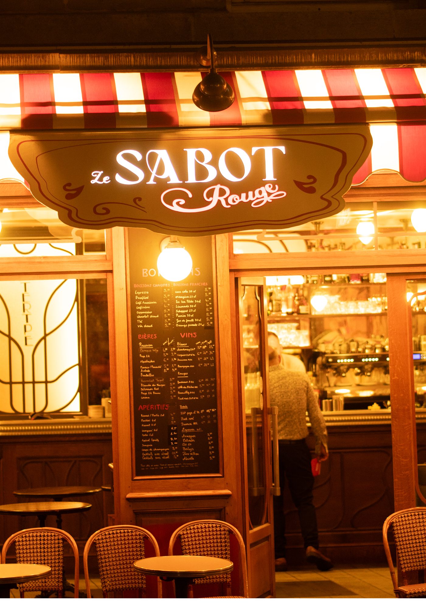 Brasserie facade in Paris after dark